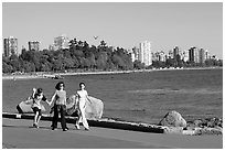 Family walking around Stanley Park. Vancouver, British Columbia, Canada (black and white)