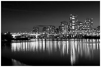 Skyline seen across False Creek at night. Vancouver, British Columbia, Canada (black and white)