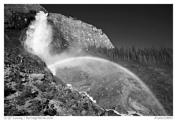 Rainbow at the base of Takakkaw Falls, late afternoon. Yoho National Park, Canadian Rockies, British Columbia, Canada