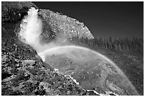 Rainbow at the base of Takakkaw Falls, late afternoon. Yoho National Park, Canadian Rockies, British Columbia, Canada (black and white)