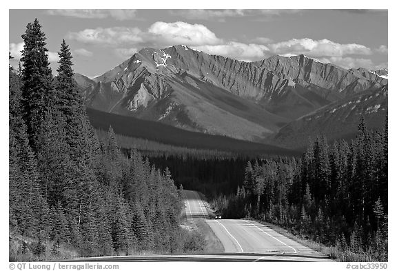 Kootenay Parkway highway and mountains, afternoon. Kootenay National Park, Canadian Rockies, British Columbia, Canada