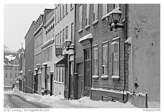 Street in winter with snow on the curb, Quebec City. Quebec, Canada