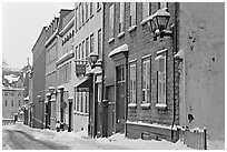 Street in winter with snow on the curb, Quebec City. Quebec, Canada ( black and white)