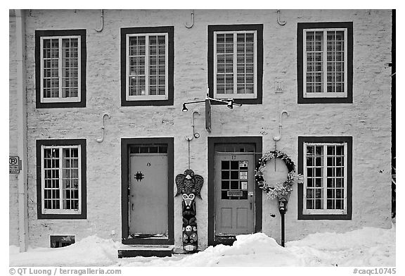 Facade in winter with snow on the curb,  Quebec City. Quebec, Canada