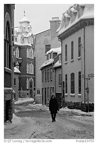 Man walking in a street in winter, Quebec City. Quebec, Canada