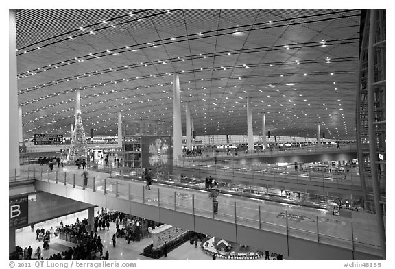 Inside main concourse at dusk, Beijing Capital International Airport. Beijing, China (black and white)