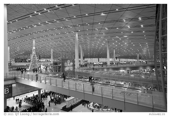 Inside main concourse at dusk, Beijing Capital International Airport. Beijing, China