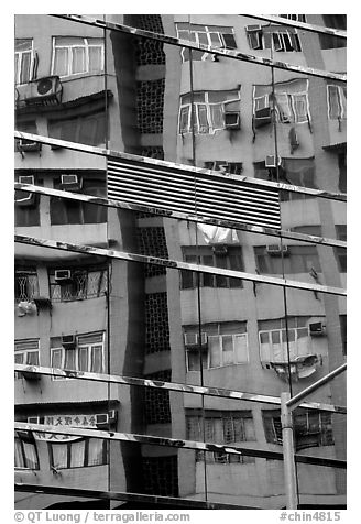 Reflection in glass building, Kowloon. Hong-Kong, China (black and white)