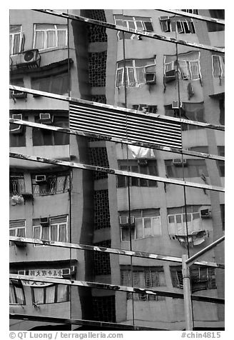 Reflection in glass building, Kowloon. Hong-Kong, China