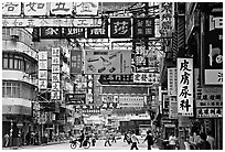 Street in Kowloon with signs in Chinese. Hong-Kong, China (black and white)