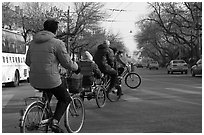 Bicyles and cyclo on street. Beijing, China (black and white)