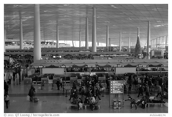 Some of the 300 check in counters, International Airport. Beijing, China (black and white)