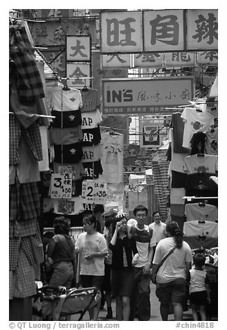 Crowded alley with clothing vendors, Kowloon. Hong-Kong, China