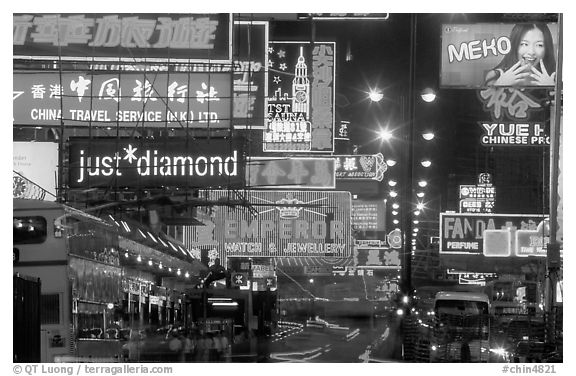 Nathan road, bustling with animation  at night, Kowloon. Hong-Kong, China (black and white)