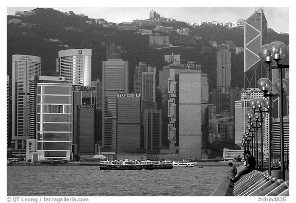 Skycrapers of Hong-Kong Island seen from the Promenade, early morning. Hong-Kong, China (black and white)