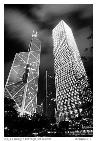 Bank of China (369m) and Cheung Kong Center (290m) buildings at night. Hong-Kong, China (black and white)