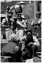 Bai tribeswomen selling incense. Shaping, Yunnan, China ( black and white)