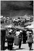 Periphery of  Monday market frequented by hill tribespeople. Shaping, Yunnan, China ( black and white)