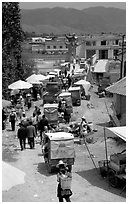 Market and village. Shaping, Yunnan, China (black and white)