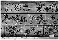 Naxi pictographs, the only hieroglyphic language still in use. Baisha, Yunnan, China (black and white)