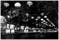 Zhengyi Lu illuminated by lanterns at night. Kunming, Yunnan, China ( black and white)