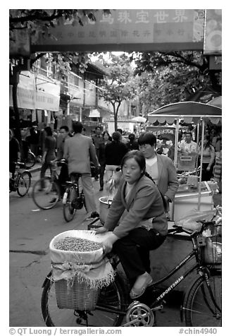 Street vendor in an old alley. Kunming, Yunnan, China (black and white)