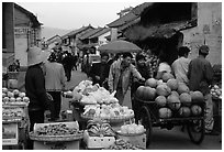 Fruits for sale on an old street. Dali, Yunnan, China (black and white)