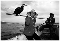 Aboard a cormorant fishing boat. Dali, Yunnan, China (black and white)