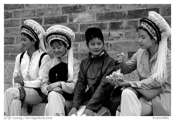 Women wearing traditional Bai dress. Dali, Yunnan, China (black and white)