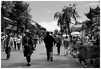 On one of the recently enlarged pedestrian streets. Dali, Yunnan, China ( black and white)