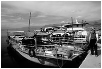 Boats on a pier of Erhai Lake. Dali, Yunnan, China ( black and white)