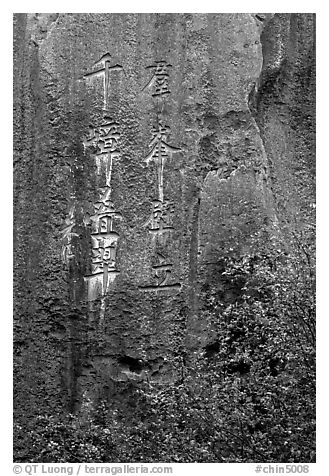 Inscription in Chinese on a limestone wall. Shilin, Yunnan, China (black and white)