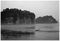 Cliffs of Lingyun Hill and Wuyou Hill at dusk, whose shape evokes a lying buddha. Leshan, Sichuan, China (black and white)