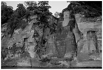 Da Fo (Grand Buddha) and two guardians seen from the river. Leshan, Sichuan, China (black and white)