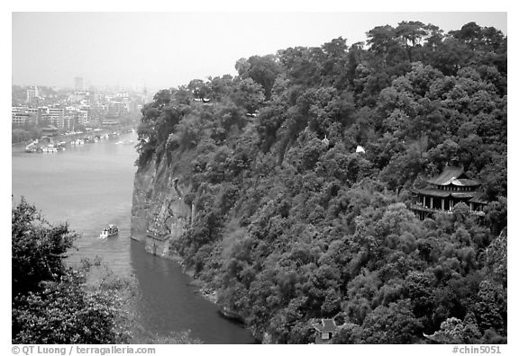 Cliffs of Lingyun Hill with the city in the background. Leshan, Sichuan, China (black and white)