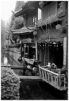 Restaurant across the canal. Lijiang, Yunnan, China ( black and white)