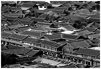 Rooftops of the old town seen from Wangu tower. Lijiang, Yunnan, China (black and white)