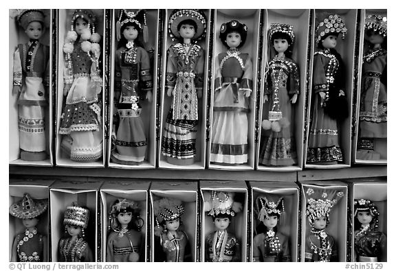 Dolls wearing traditional Bai dress. Lijiang, Yunnan, China