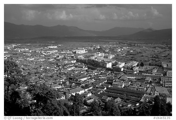 Old town, new town, and surrounding fields seen from Wangu tower. Lijiang, Yunnan, China (black and white)