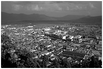 Old town, new town, and surrounding fields seen from Wangu tower. Lijiang, Yunnan, China (black and white)