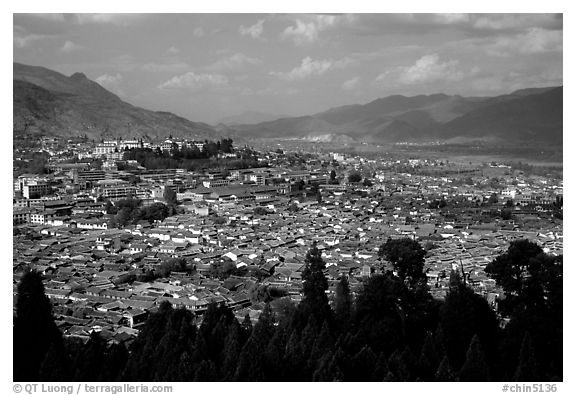 Old town, new town, and surrounding fields seen from Wangu tower. Lijiang, Yunnan, China (black and white)