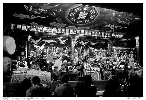 Naxi orchestra in Dayan Naxi concert hall. Lijiang, Yunnan, China (black and white)