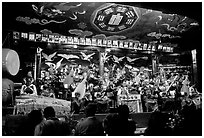 Naxi orchestra in Dayan Naxi concert hall. Lijiang, Yunnan, China ( black and white)