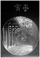 Circular doorway in Bailongdong temple. Emei Shan, Sichuan, China (black and white)