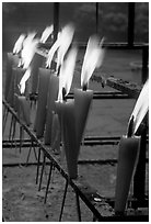 Candles burning. Emei Shan, Sichuan, China (black and white)