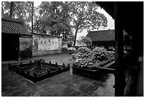 Courtyard of Hongchunping temple in the rain. Emei Shan, Sichuan, China (black and white)