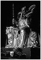 Sculpture inside Xiangfeng temple. Emei Shan, Sichuan, China (black and white)