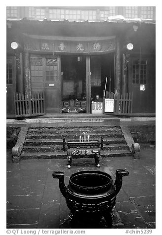 Urn in courtyard inside Xixiangchi temple. Emei Shan, Sichuan, China