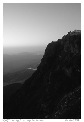 Sunset on Jinding Si (Golden Summit), perched on a steep cliff. Emei Shan, Sichuan, China (black and white)