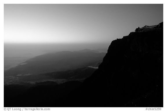 Sunset on Jinding Si (Golden Summit), perched on a steep cliff. Emei Shan, Sichuan, China (black and white)